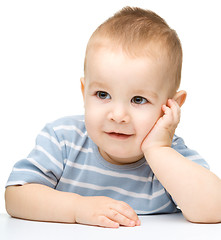 Image showing Portrait of a cute and pensive little boy