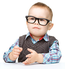 Image showing Portrait of a cute little boy wearing glasses