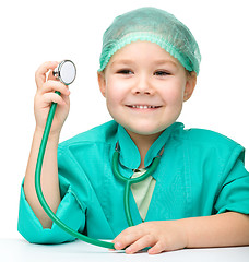 Image showing Cute little girl is playing doctor