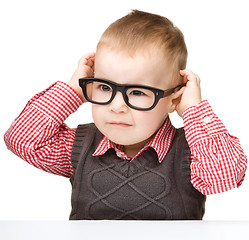 Image showing Portrait of a cute little boy wearing glasses