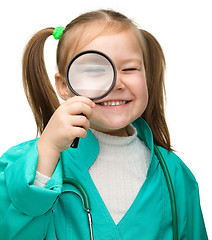 Image showing Cute little girl is playing doctor