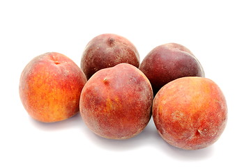 Image showing five peaches