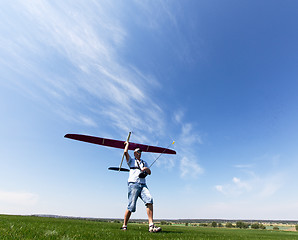 Image showing Man launches into the sky RC glider