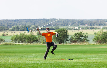 Image showing Man launches into the sky RC glider