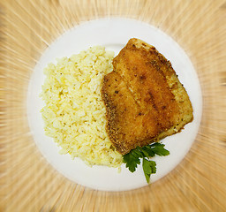 Image showing fried tilapia with rice garnish
