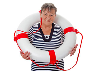 Image showing Senior woman with lifebelt