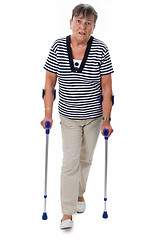 Image showing Senior woman on crutches