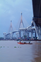 Image showing Bridge and tug-boat in Bangkok, Thailand