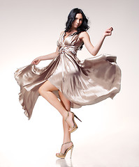 Image showing brunette in waving dress