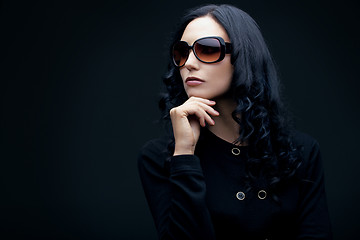Image showing brunette wearing sunglasses