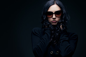 Image showing brunette wearing sunglasses