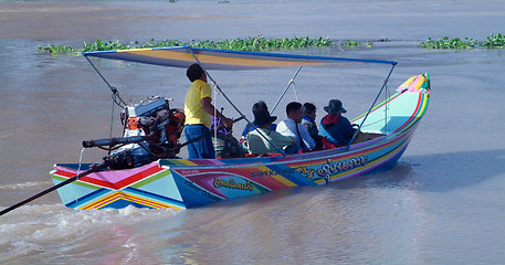 Image showing Longtail boat with passengers