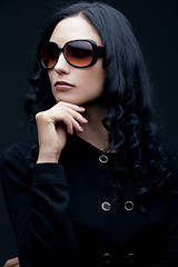 Image showing brunette wearing sunglasses