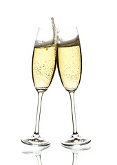 Image showing two glasses of sparkling wine clinking