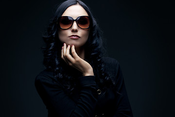 Image showing brunette wearing sunglasses