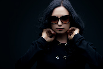 Image showing brunette wearing sunglasses