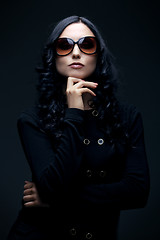 Image showing brunette wearing sunglasses