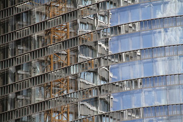Image showing Construction site reflected in a house