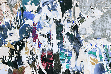 Image showing grunge background with old torn posters 