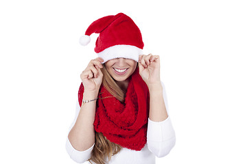 Image showing young beautiful woman with red scarf and christmas hat