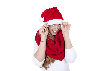 Image showing young beautiful woman with red scarf and christmas hat