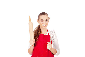 Image showing beautiful woman is baking cookies for christmas