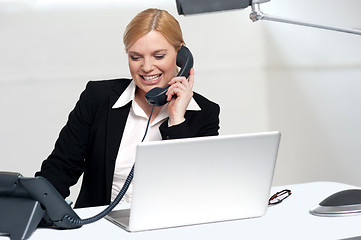 Image showing Female secretary communicating with her boss