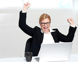 Image showing Caucasian corporate woman enjoying success