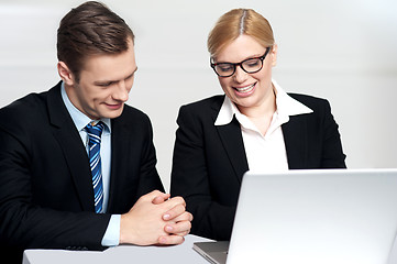 Image showing Colleagues working together on laptop