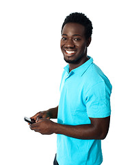 Image showing Handsome african man using cellphone