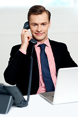Image showing Male executive on a business call