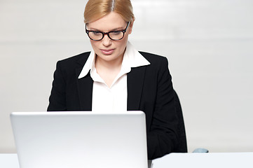 Image showing Corporate lady working on laptop