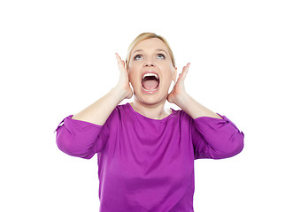 Image showing Woman shouting with hands on ears