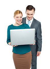 Image showing Business people enjoying funny videos on laptop