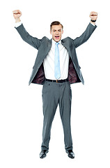 Image showing Full length portrait of a excited young executive