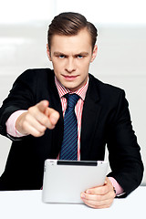 Image showing Tech savvy corporate man pointing at you