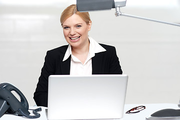 Image showing Pretty businesswoman at work