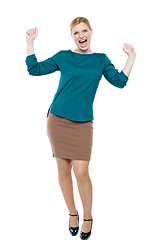 Image showing Excited businesswoman celebrating success