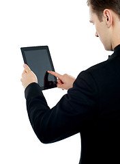 Image showing Man operating electronic digital device