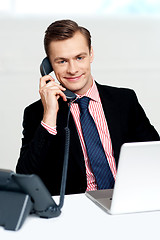 Image showing Handsome corporate man communicating