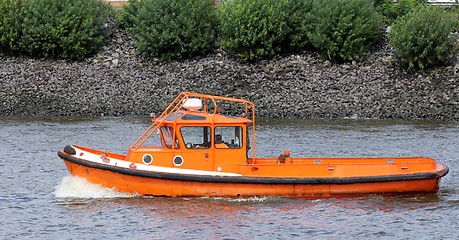 Image showing orange boot on a channel