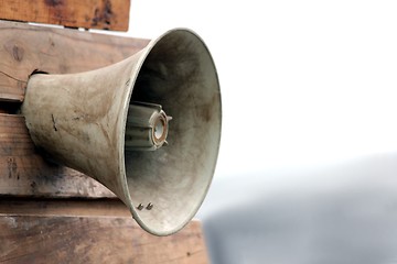 Image showing megaphone on a wooden wall