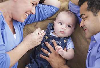 Image showing Mixed Race Family Playing on the Blanket