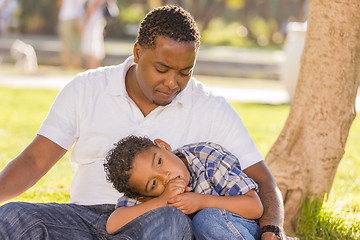 Image showing African American Father Worried About His Mixed Race Son