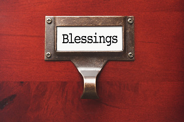 Image showing Lustrous Wooden Cabinet with Blessings File Label