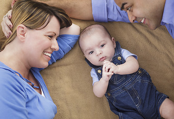 Image showing Mixed Race Family Playing on the Blanket