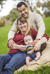 Image showing Happy Mixed Race Family Posing for A Portrait