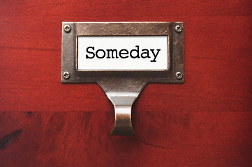 Image showing Lustrous Wooden Cabinet with Someday File Label