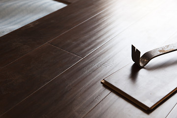 Image showing Pry Bar Tool with New Laminate Flooring