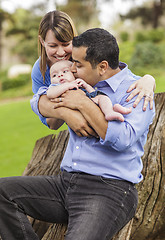 Image showing Happy Mixed Race Family Enjoying The Park